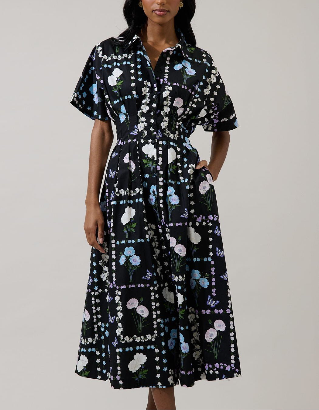Wilderra Trevis floral midi shirt dress with a collar, smocked waist and botanical border print