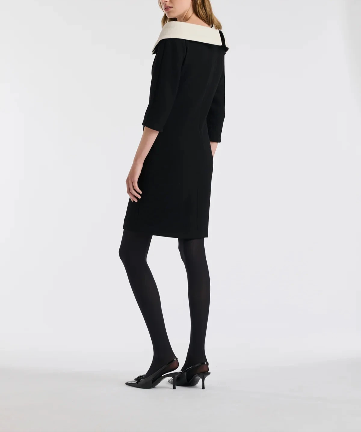 Knee length wool crêpe Bardot neck dress in black by WEILL
