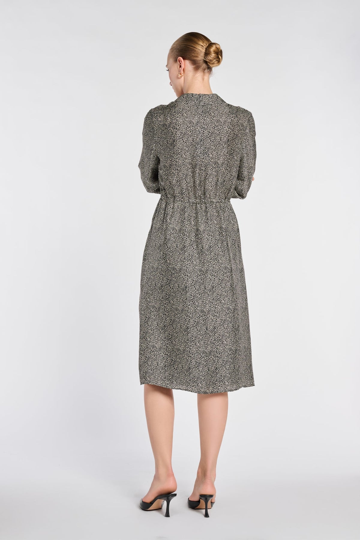 Full back view of Weill Paris leopard print midi shirt dress with a gathered waist, long sleeves and straight hem.