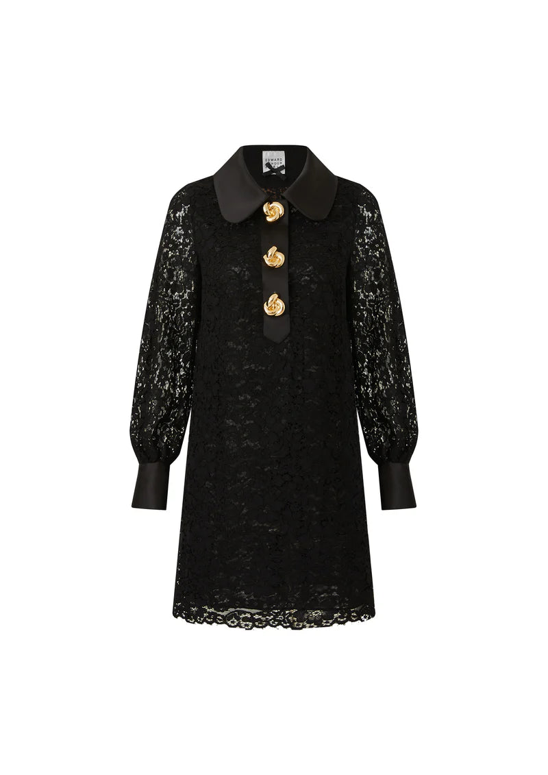 Black lace knee‑length shift with Peter Pan collar, gold button placket and long sleeves. An elegant LBD for cocktail parties, dinners and holiday events.