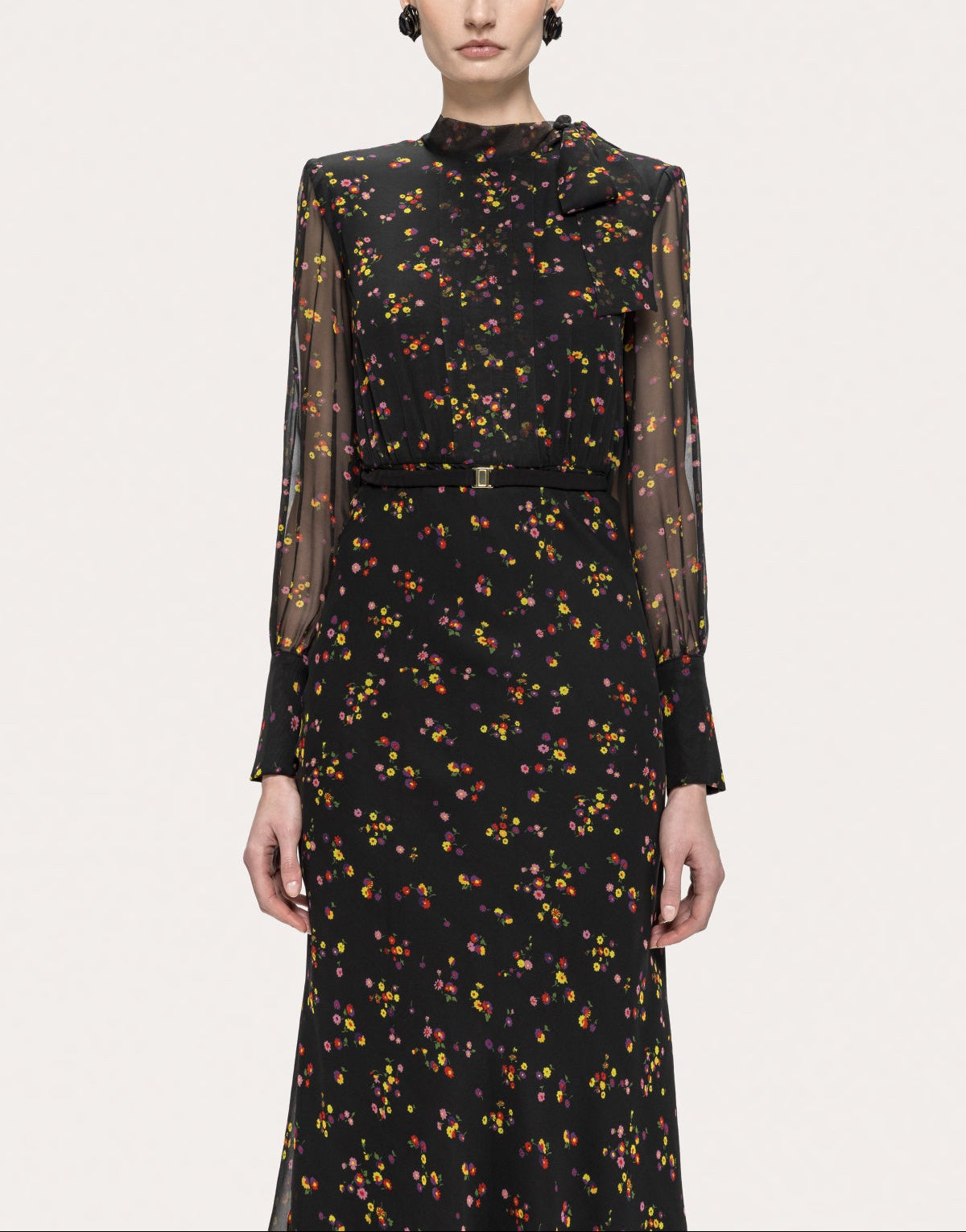 Front detail of the NISSA black floral silk midi dress with high neckline, shoulder bow and slim matching belt