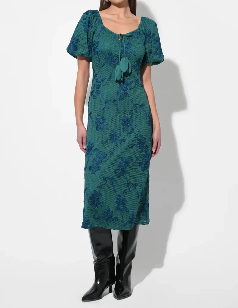 Emerald green textured knit midi dress with blue floral pattern, puff sleeves and scoop neckline with tassel tie.