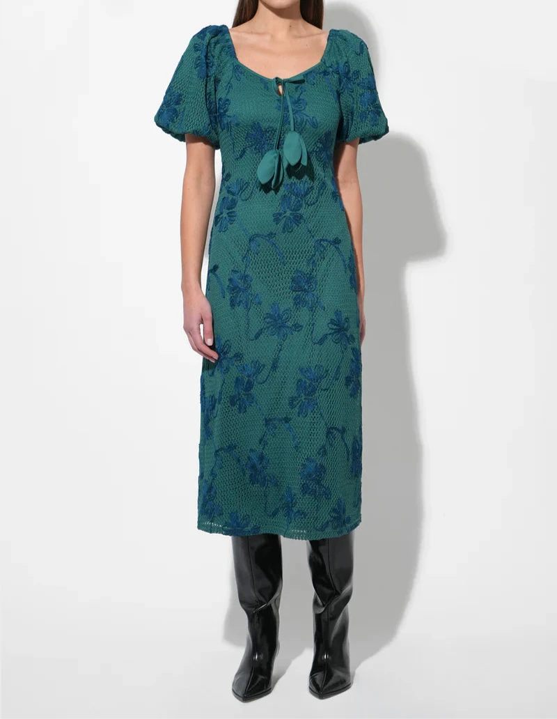 Emerald green knit midi dress with a fitted silhouette by Adelyn Rae