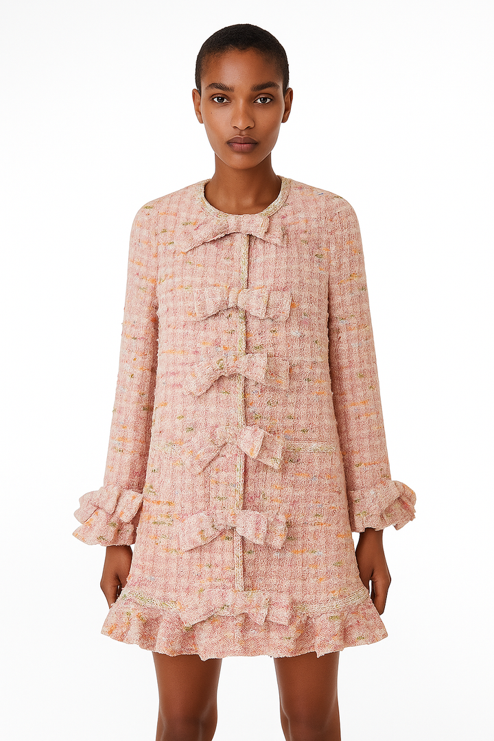 Pastel blush pink tweed coat dress with matching bow buttons, 1960s style, by Edward Achour.