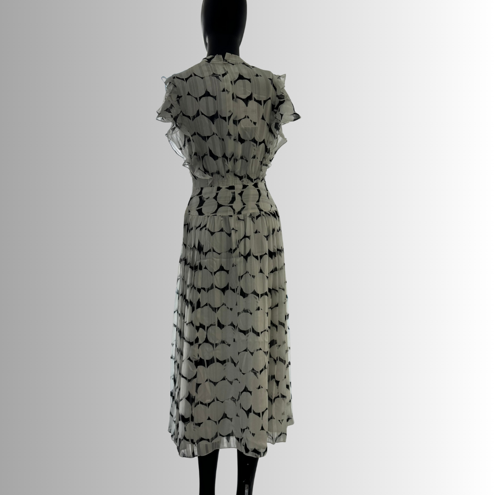 Back view of black and white chiffon A-line midi dress with abstract circle print and gathered neckline by Nora Noh