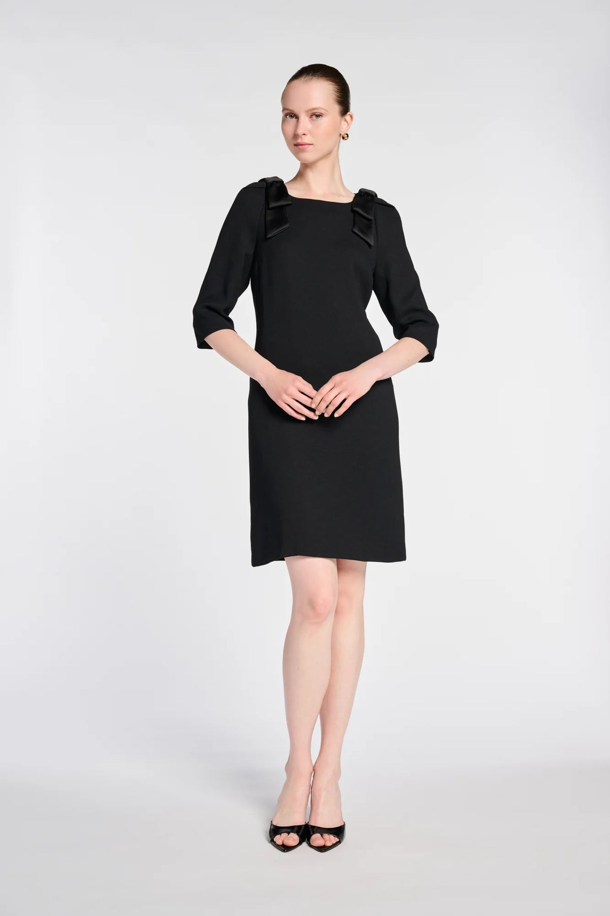 WEILL Paris black cocktail dress with satin shoulder bows, three-quarter sleeves and an above-knee hem, front view.