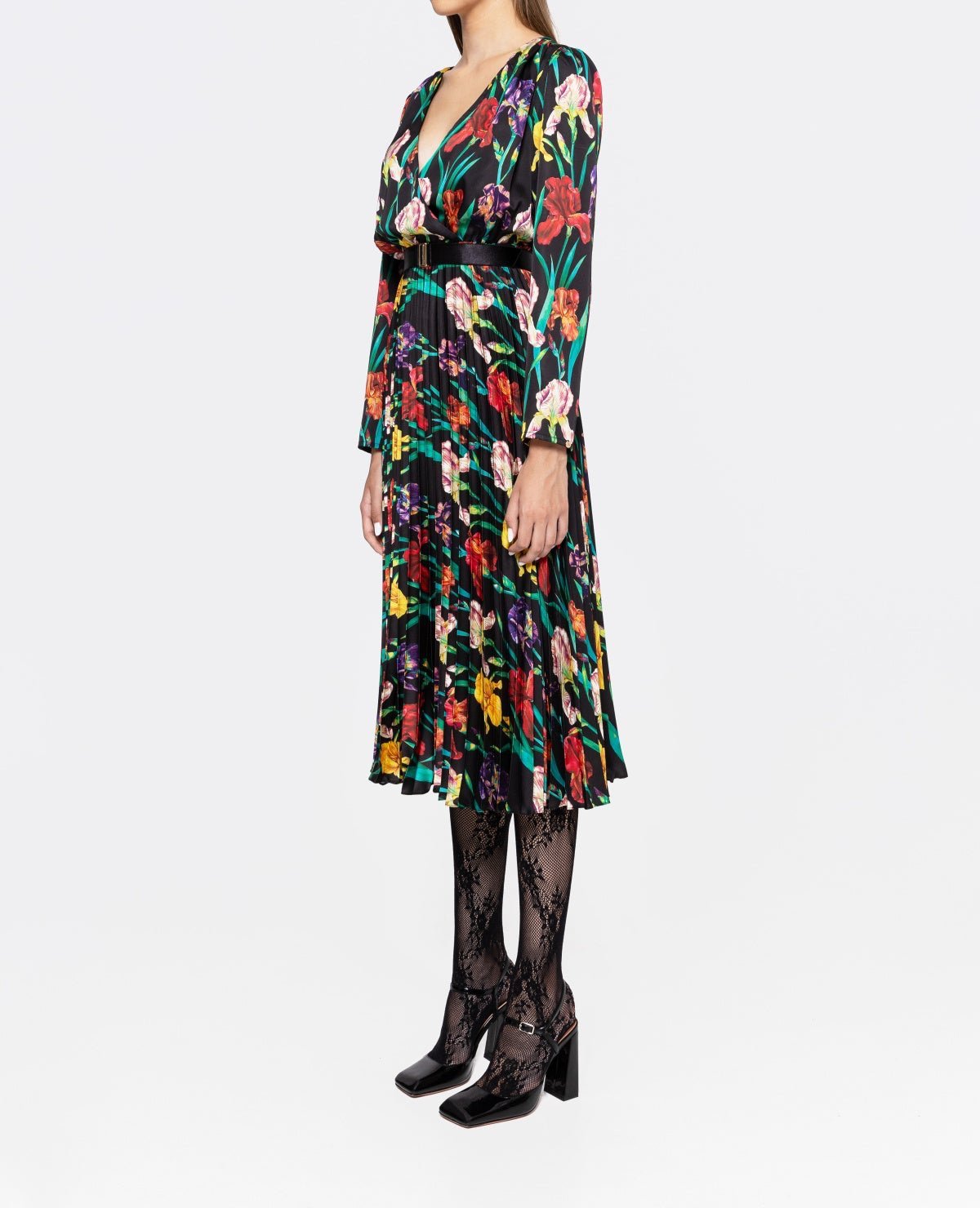 Side view of multicolor iris floral pleated midi dress featuring deep V wrap bodice and long sleeves