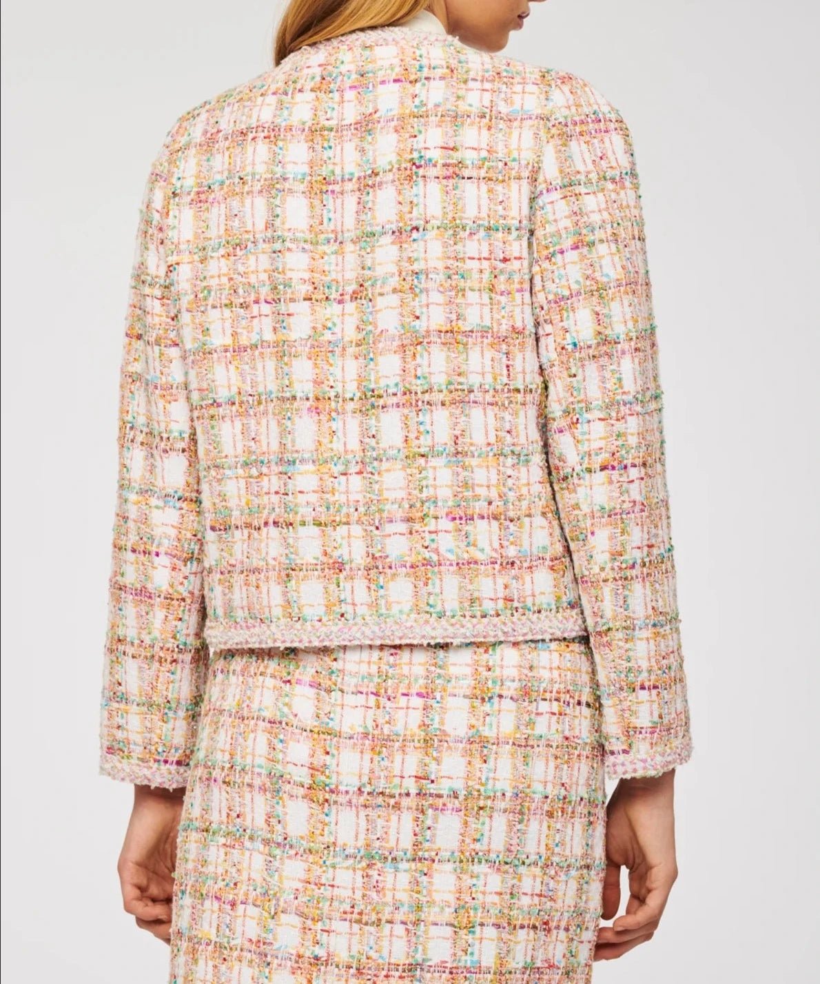 Elegant pastel tweed jacket for coordinated set styling