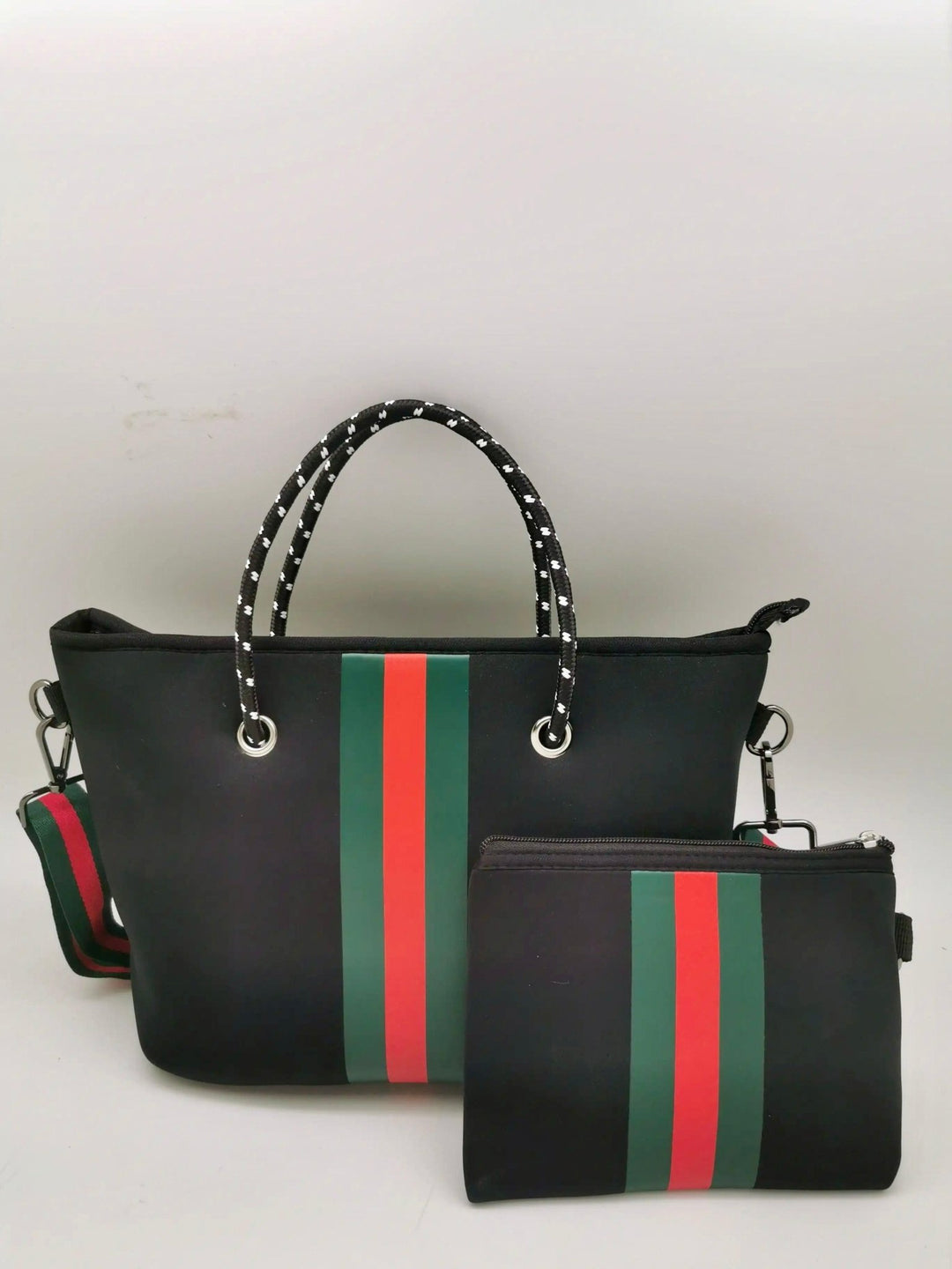 Black mini neoprene tote bag with red and green center stripe and rope handles