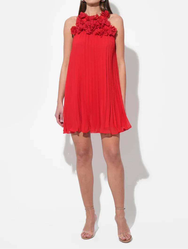 Red midi dress with pleated design and 3D floral appliqué by Adelyn Rae