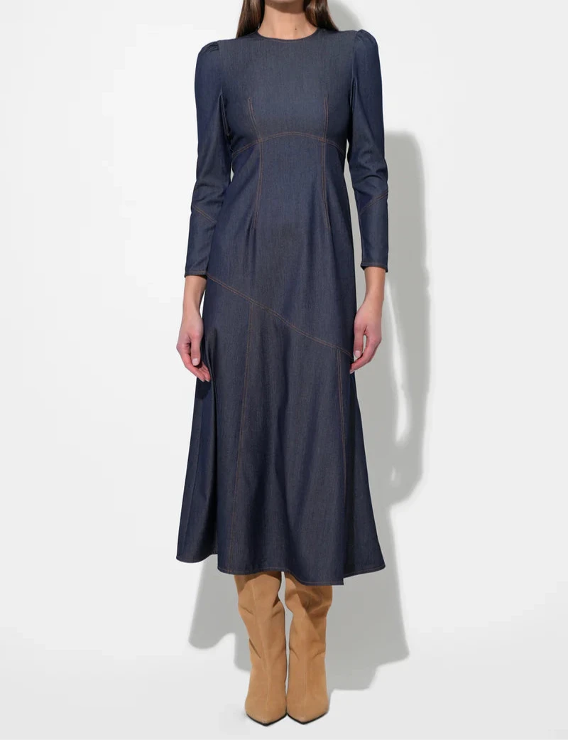 denim blue long-sleeve midi dress with crew neckline, paneled A-line skirt and contrast topstitching—polished day-to-night style at BTK COLLECTIONS.