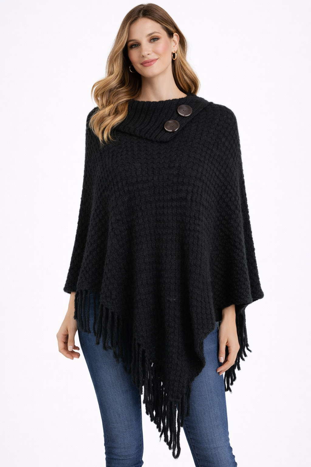 Women’s wool fringe poncho layered with jeans