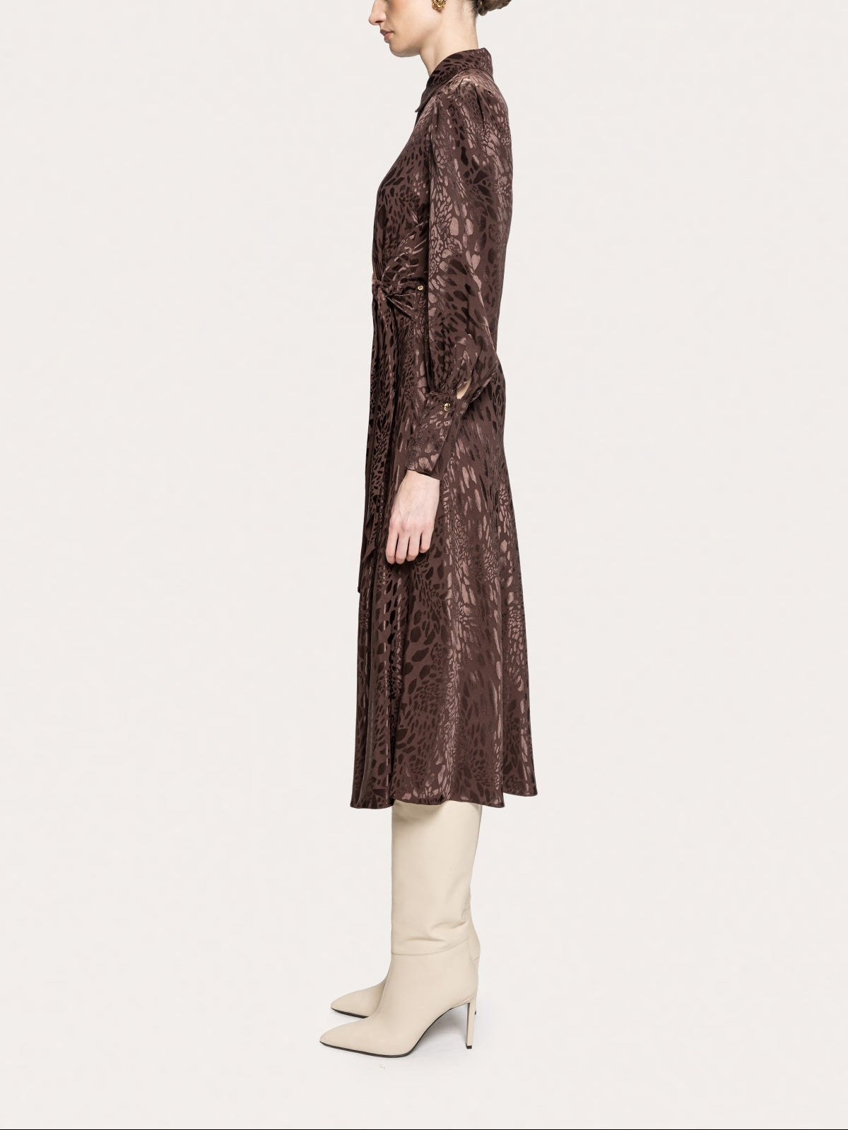 Side view of NISSA brown leopard print midi shirt dress showing long cuffed sleeves and a fluid calf-length skirt.