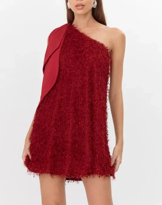 Black one-shoulder fringe mini dress from Adelyn Rae, featuring a fitted silhouette and trendy fringe detailing.