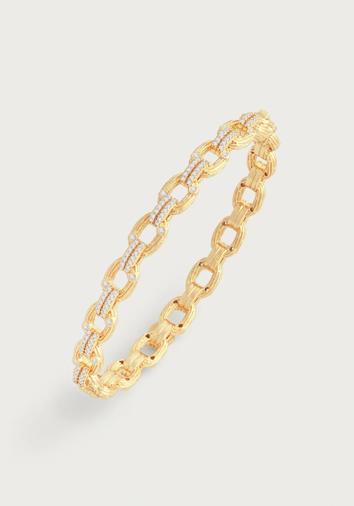 Enchanted Forest chain hinged bangle by Anabel Aram featuring interlocking gold‑plated links with crystal accents and a concealed hinge