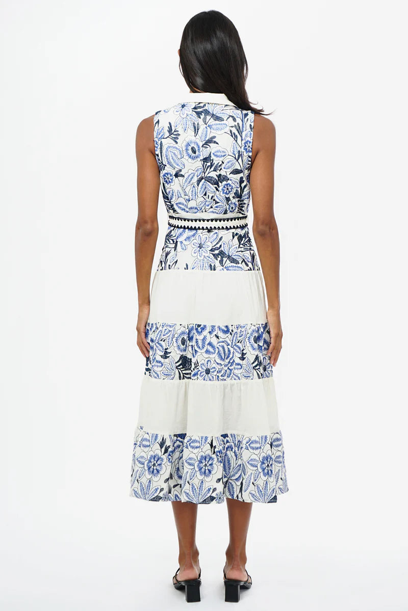 Light blue embroidered sleeveless midi dress by Adelyn Rae with a feminine silhouette and delicate detailing.