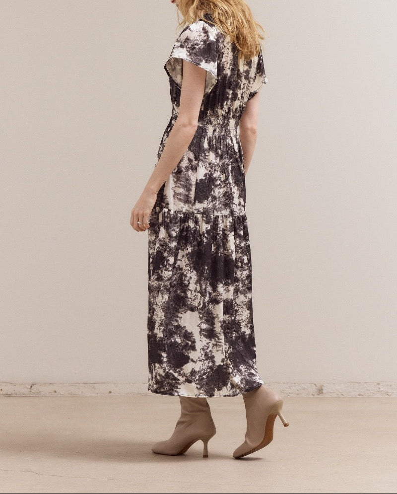 Ivory printed ruffle satin midi dress by Grade & Gather, featuring a tiered design and cap sleeves.