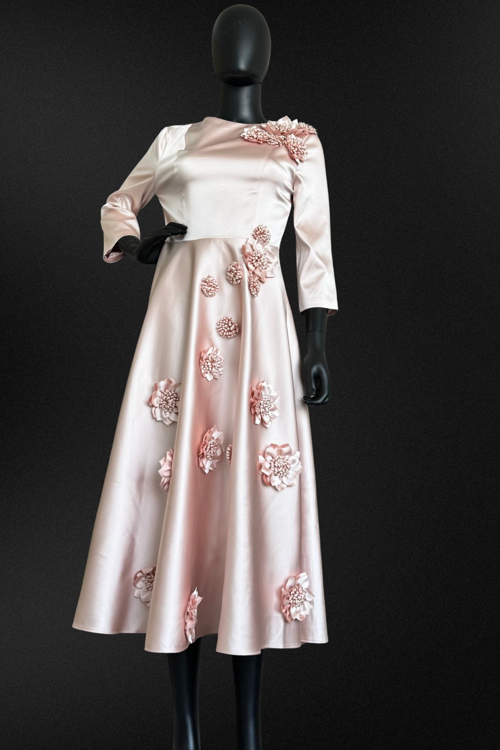 Lilac floral midi dress by Qui Prive featuring long sleeves, a modest crew neckline, tiered skirt detail, and elegant floral print, perfect for daytime events.