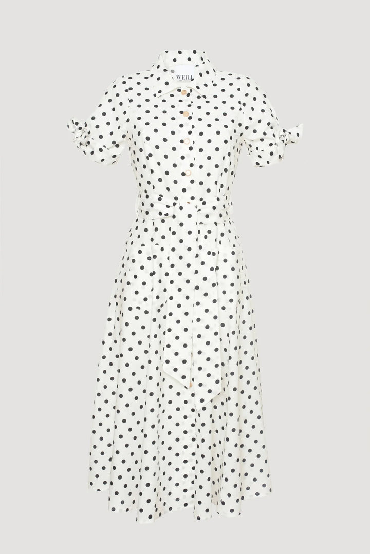 White midi-length polka dot shirt dress with black dots, collar, button-down front, and tie sleeves 