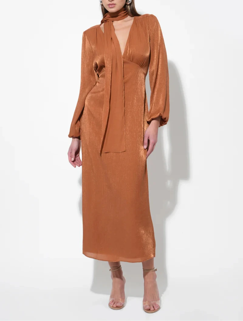 Rust copper midi dress with attached neck scarf, deep V‑neck and softly draped skirt