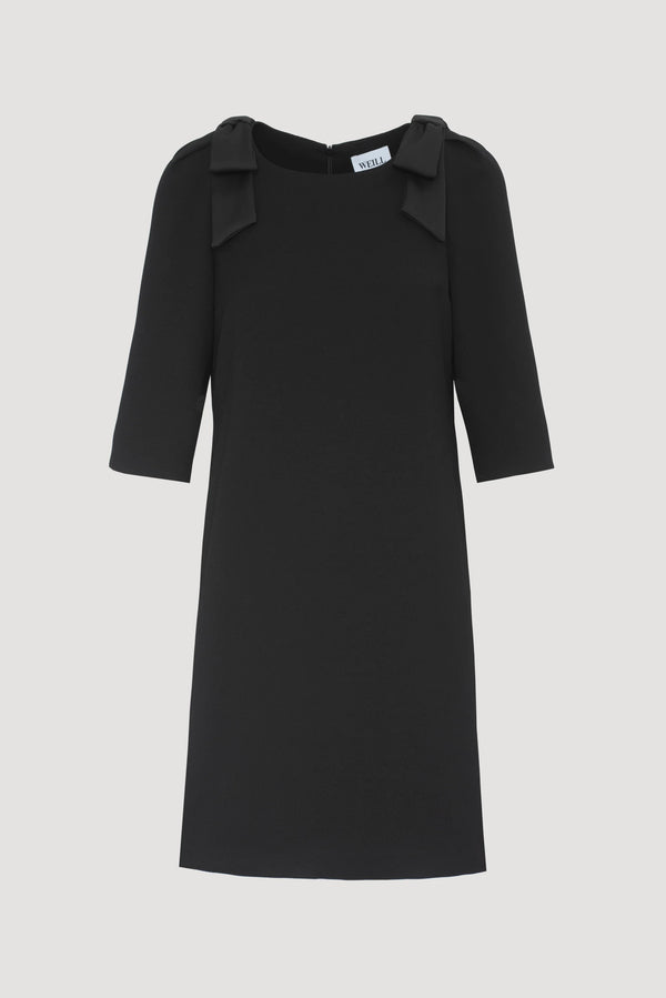 WEILL Paris black satin bow cocktail dress displayed without a model, showing the straight silhouette and three-quarter sleeves.