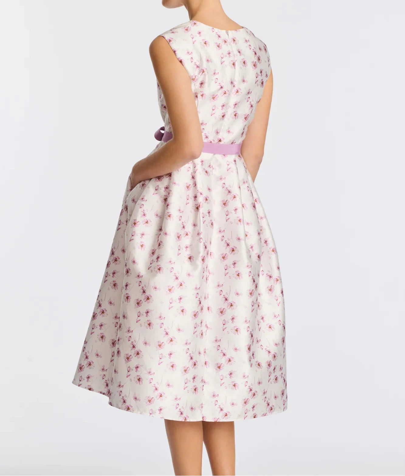 Back view of sleeveless floral taffeta midi dress with full midi skirt and floral print