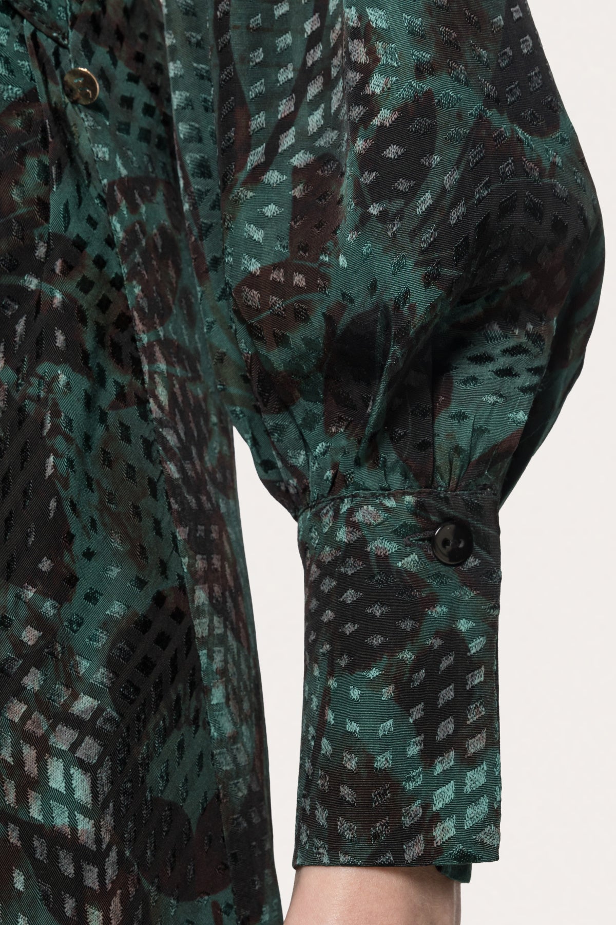 Front view of NISSA green floral tie-waist midi shirt dress with a softly flared skirt.