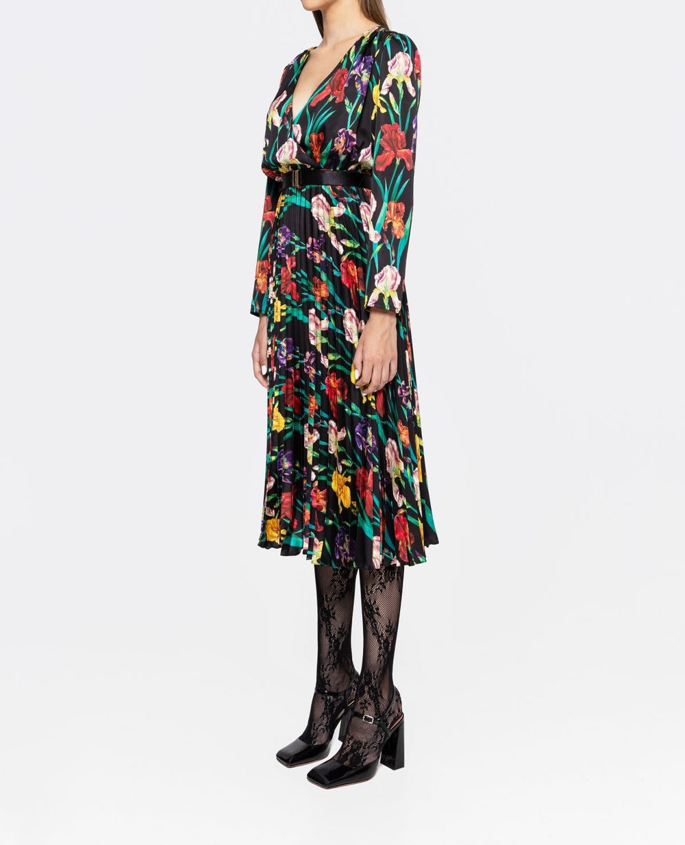 Side view of multicolor iris floral pleated midi dress featuring deep V wrap bodice and long sleeves