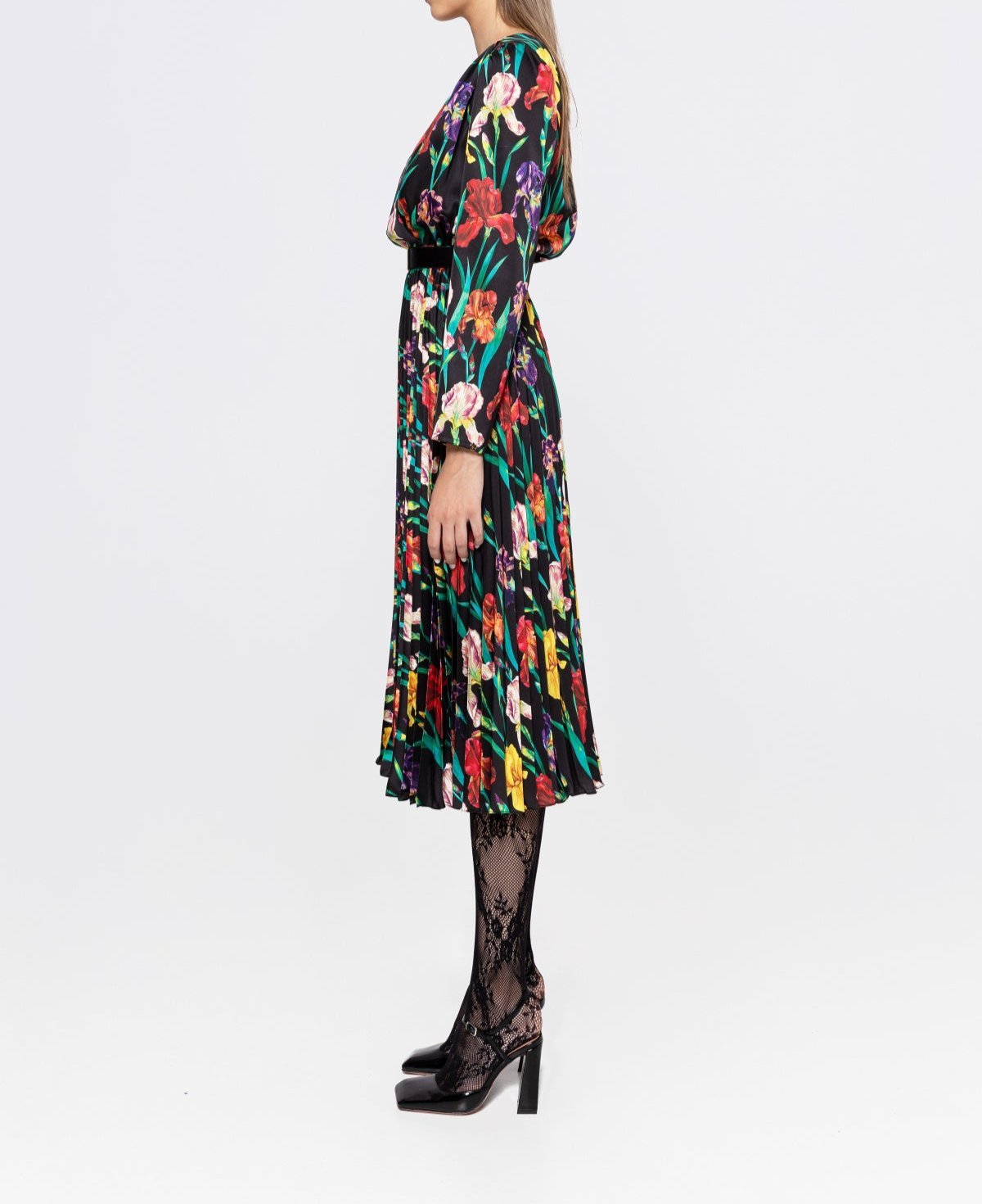 Alternate side angle of black floral satin midi with belted waist and accordion‑pleat skirt