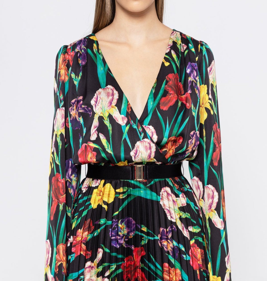 Close‑up of surplice V bodice showing multicolor iris print on satin and waist belt