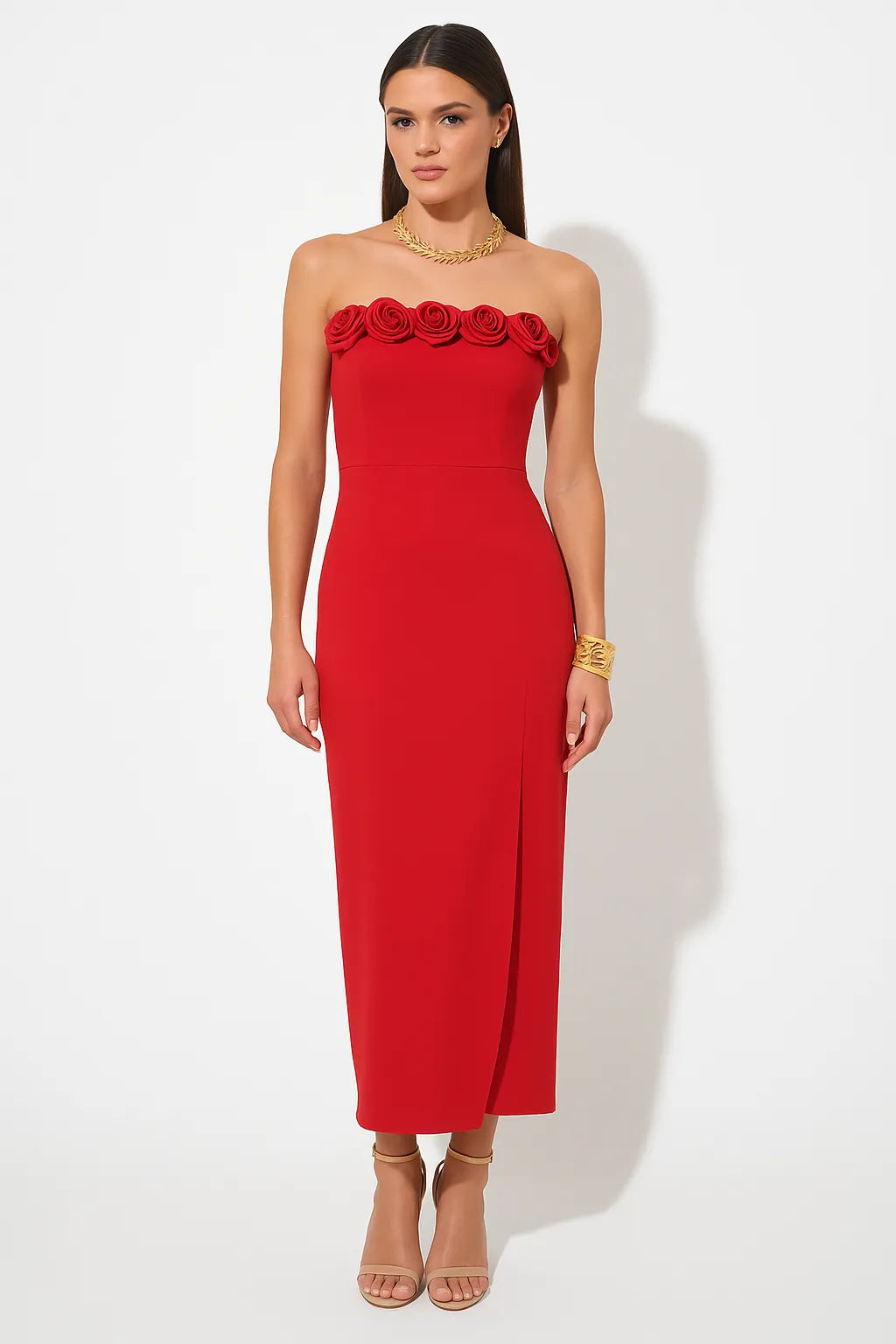 Red strapless dress with floral details on a white background