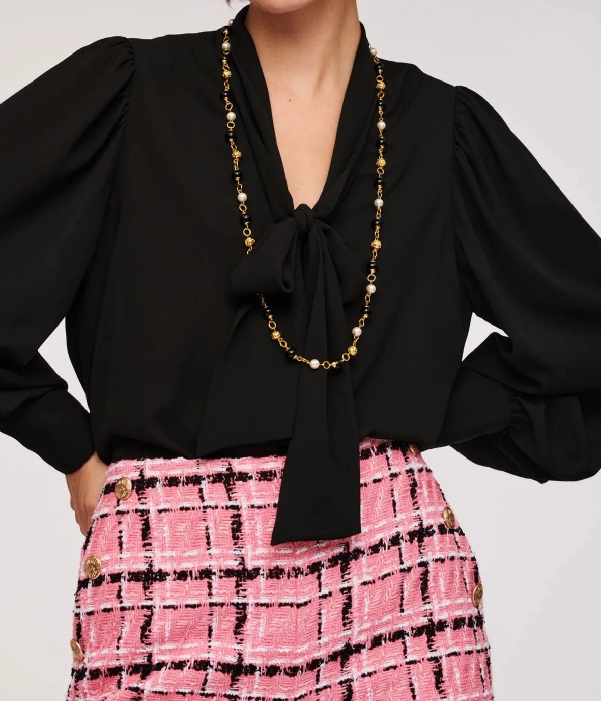 Classic long pearl necklace by Weill Paris styled with blouse for elegant workwear look