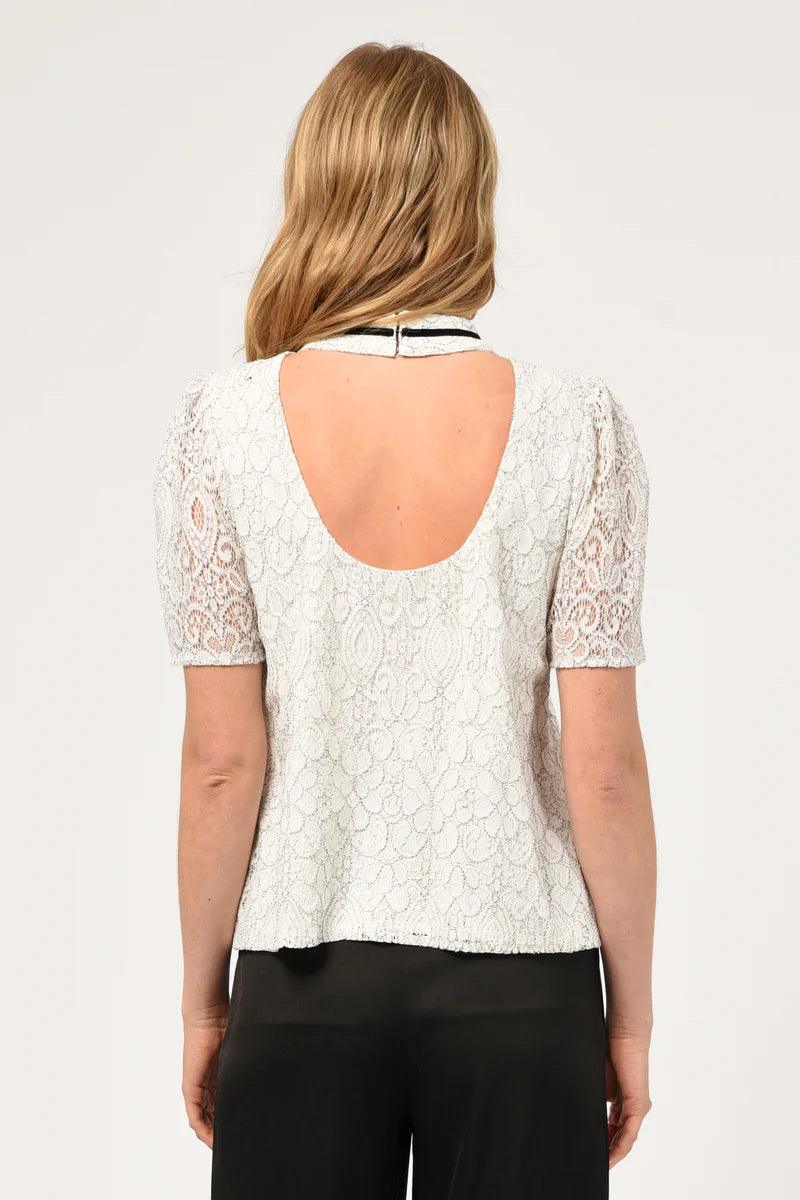 Adelyn Rae Nelli puff sleeve lace top with high neck and black ribbon detail