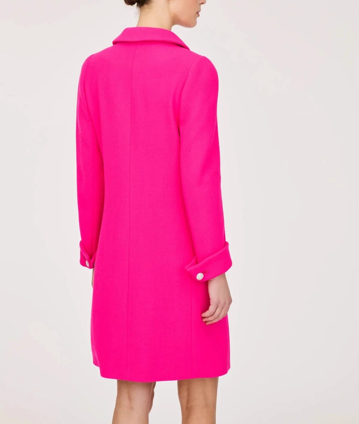 Rear detail of the Weill Paris pink wool crepe jacket, showing the collar, center seam and jeweled turn-back cuffs.
