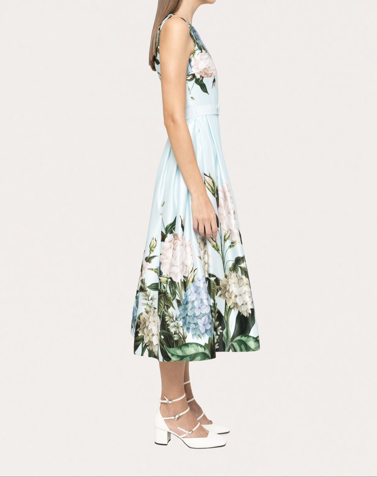 Side profile of light blue floral-print taffeta midi dress with full skirt and sleeveless bodice by NISSA-BTK COLLECTIONS