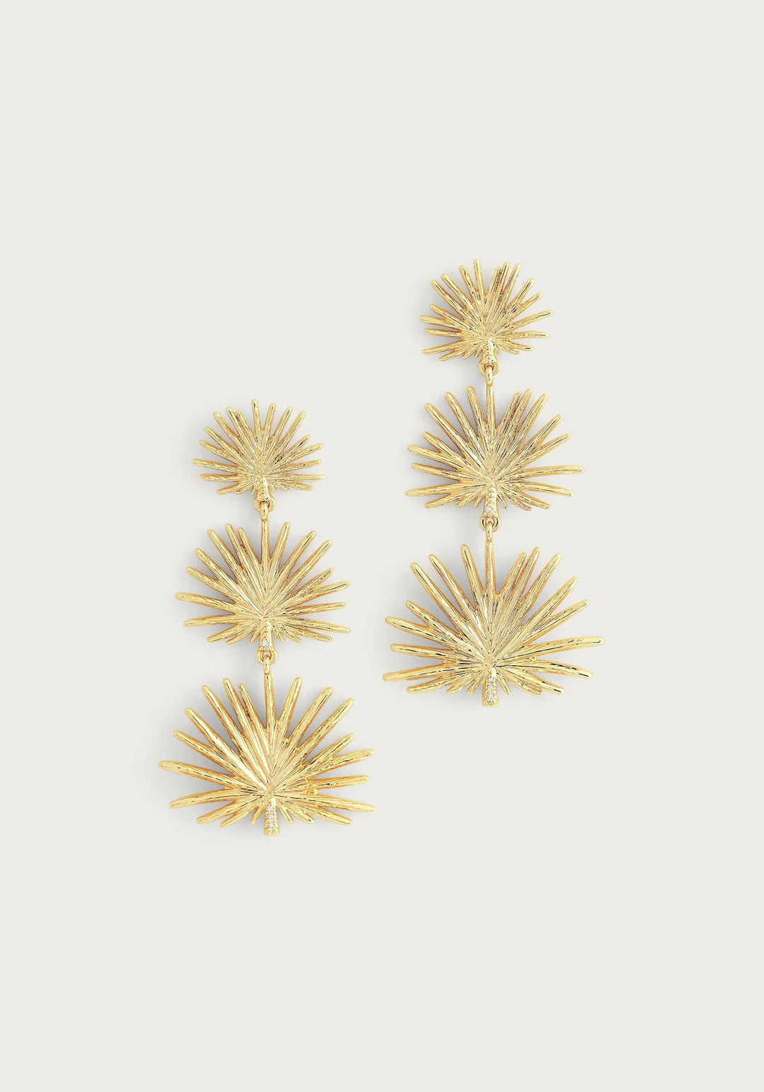 Triple Fan Palm Dangle Earrings by Anabel Aram featuring 18K gold-dipped brass fan leaves with hand-textured details and crystal-accented stems