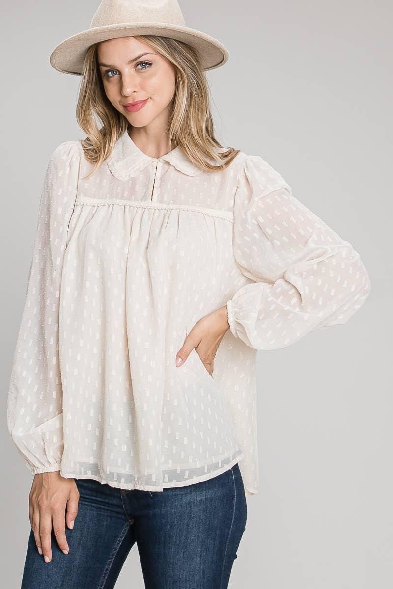 Champagne geo lurex jacquard blouse with a rounded collar, delicate yoke trim and sheer bishop sleeves.
