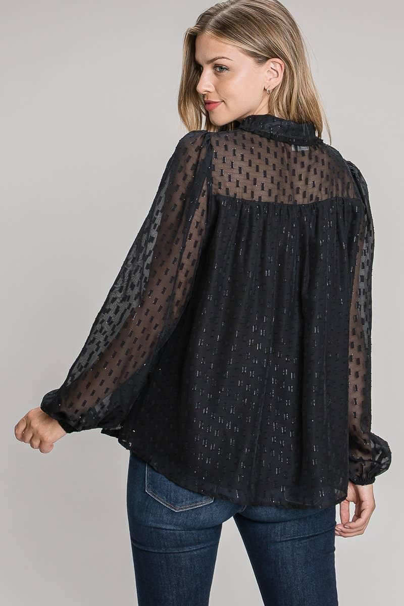 Back view of the black Allie Rose blouse showing the sheer geometric yoke and gathers across the back.