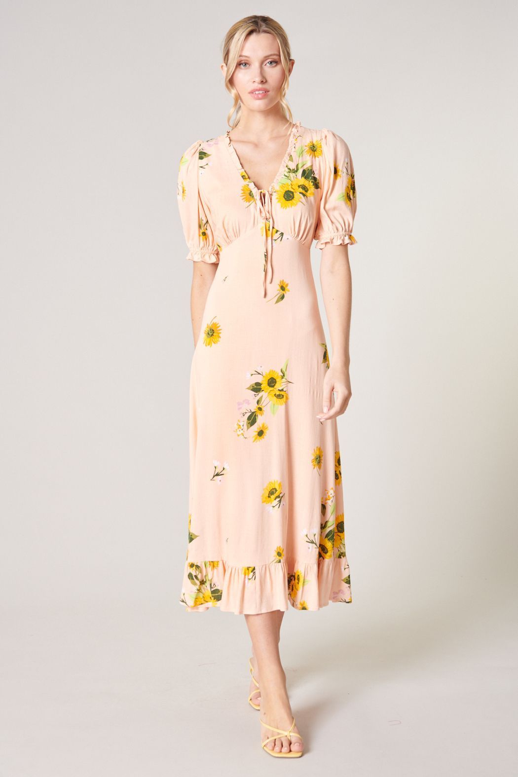 Yellow floral puff sleeve midi dress with defined waist front view