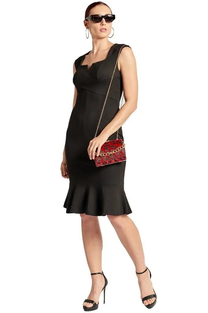 Front view of black seamed stretch ponte midi dress featuring square neckline and knee-length mermaid hem