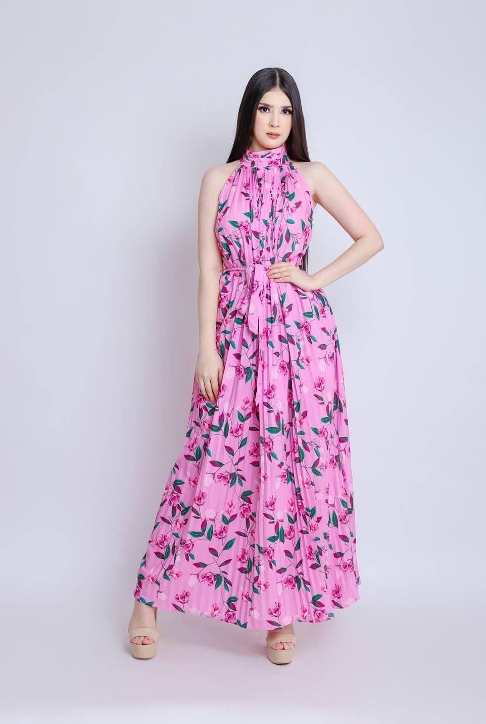 Like the Moon pink floral pleated maxi dress with a mock neck, sleeveless shoulders and matching waist tie, shown from the front.