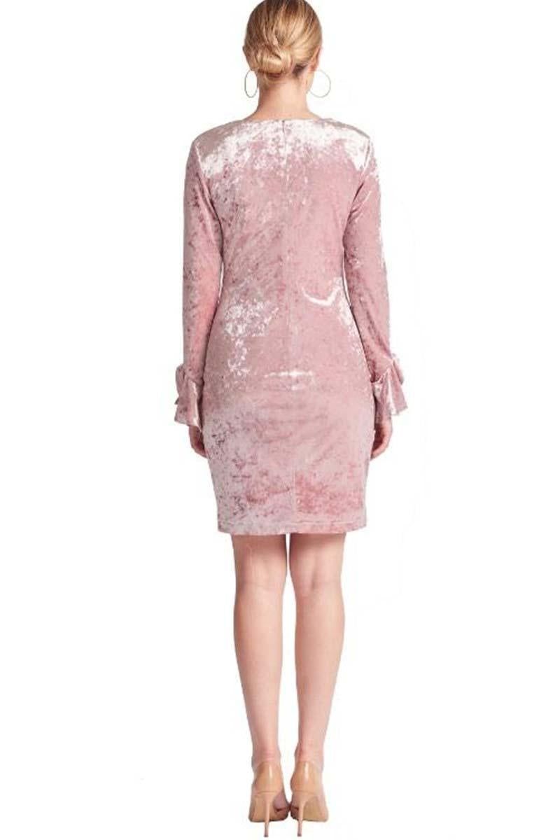 Back view of the rose pink Kara velvet sheath dress, showing the concealed back zip and above-knee hem.
